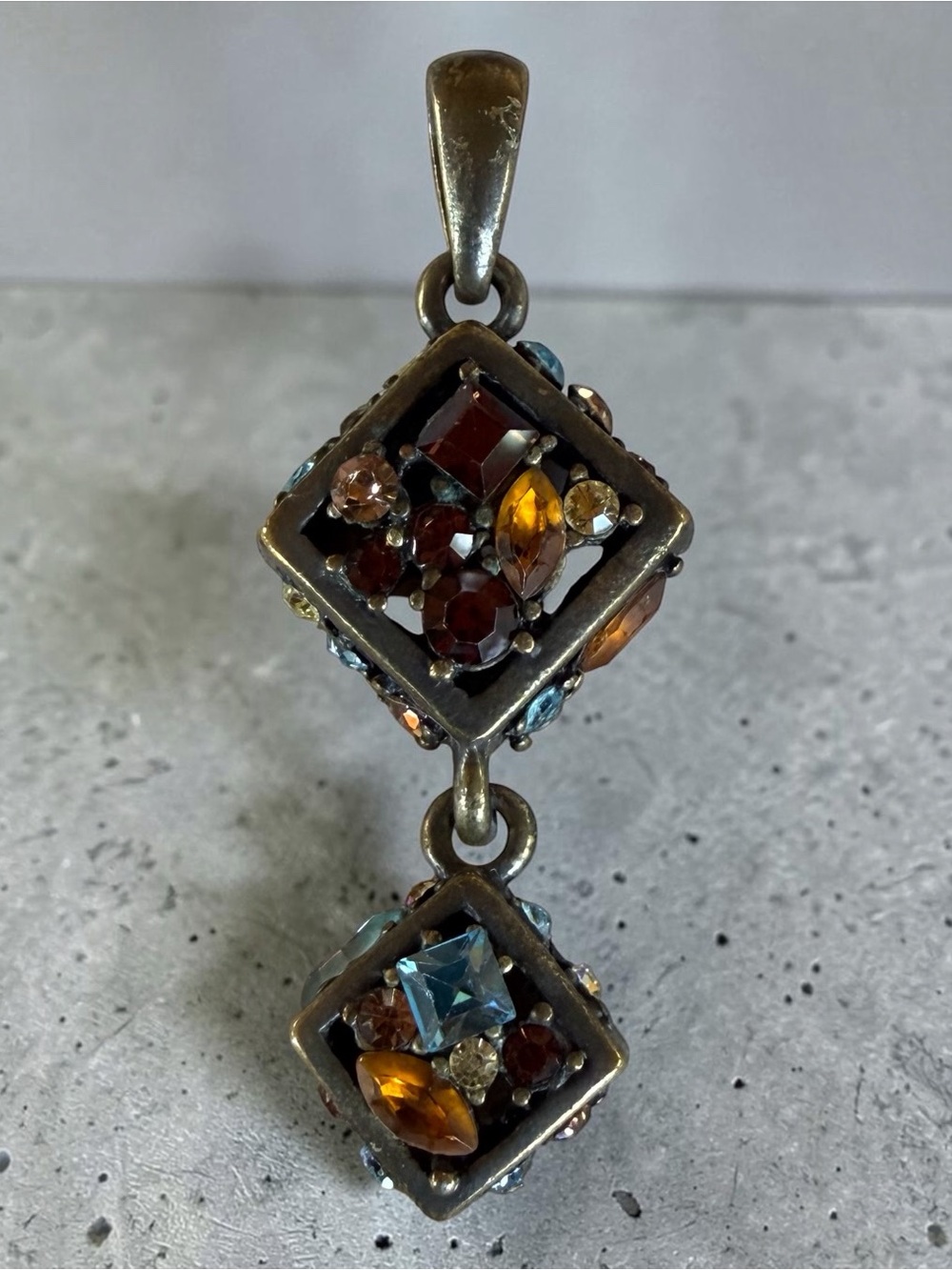 Retired Lia Sophia Fossil Pendant with Amber and Blue Stones